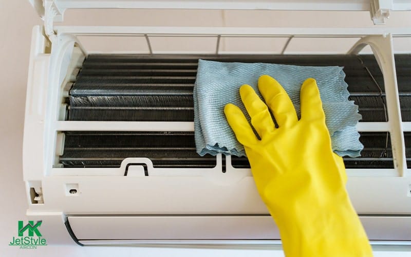 Wiping Clean a Dirty Aircon Unit